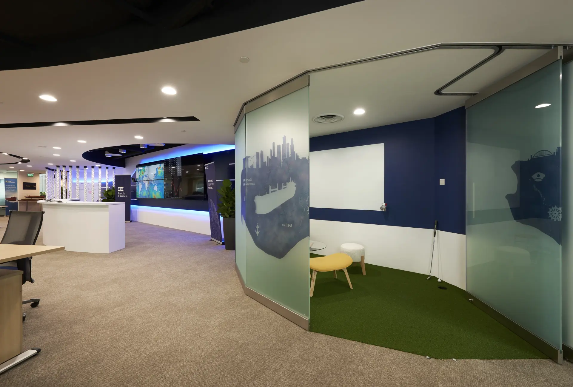 Corporate office interior featuring custom interior design company singapore at Torvald Klaveness Singapore.